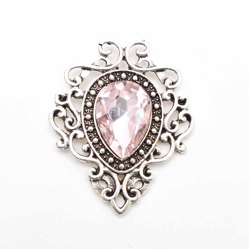 Spilla fiore goccia argento