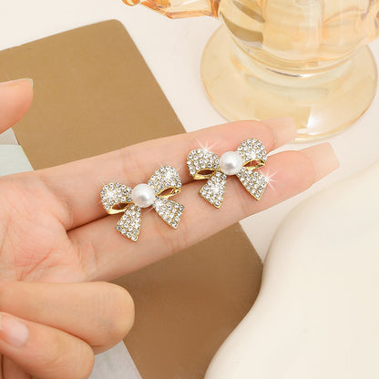 Orecchini farfalla con strass pieni