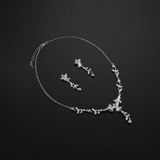 Collana e orecchini fiori e viti