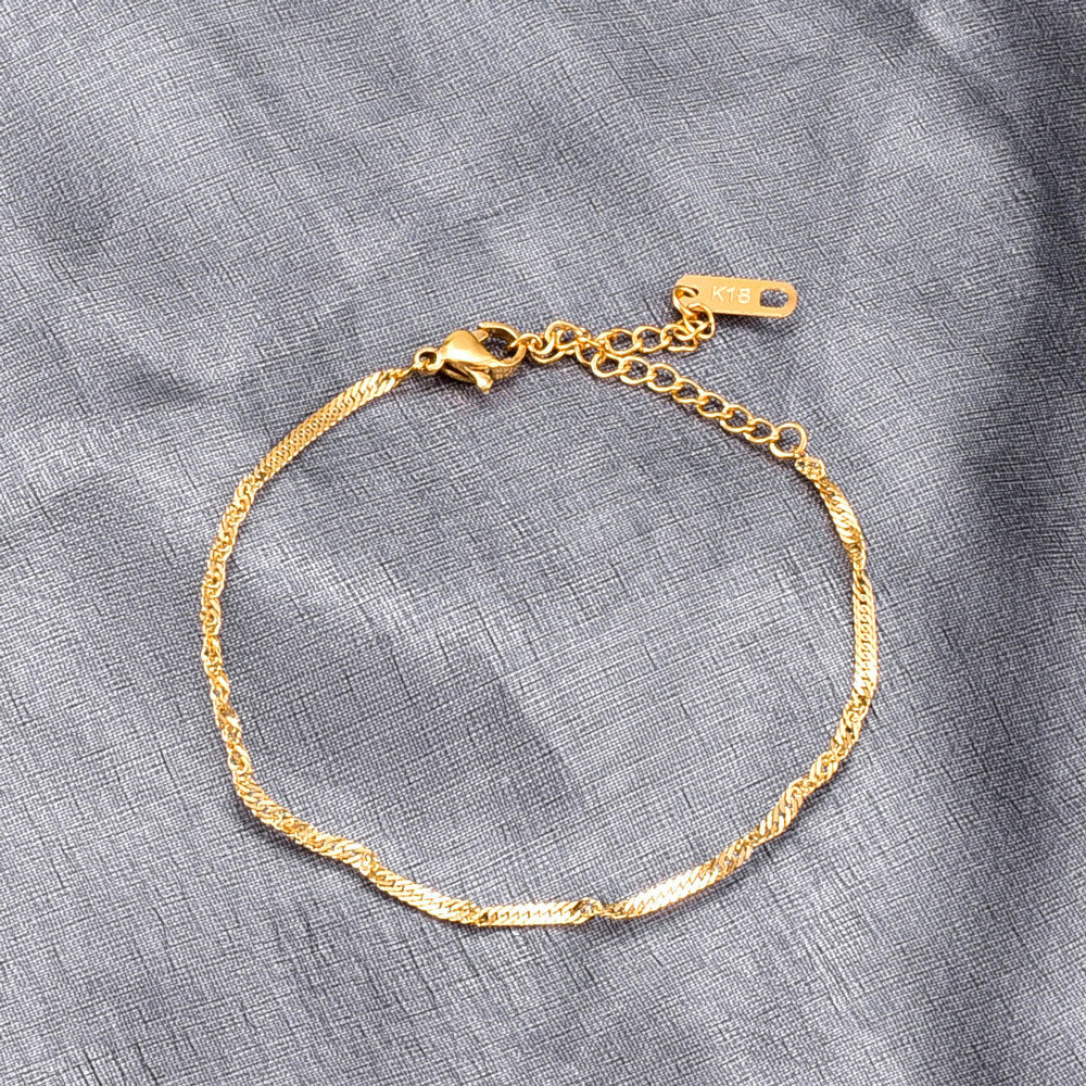 Bracciale titanio placcato oro a spira