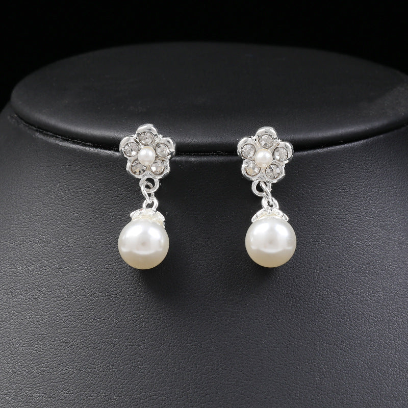 Collana e orecchini perle floreali