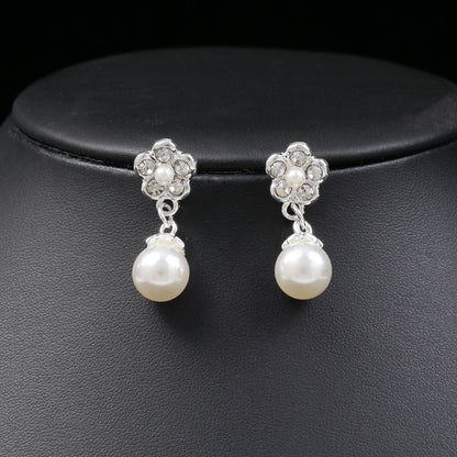 Collana e orecchini perle floreali