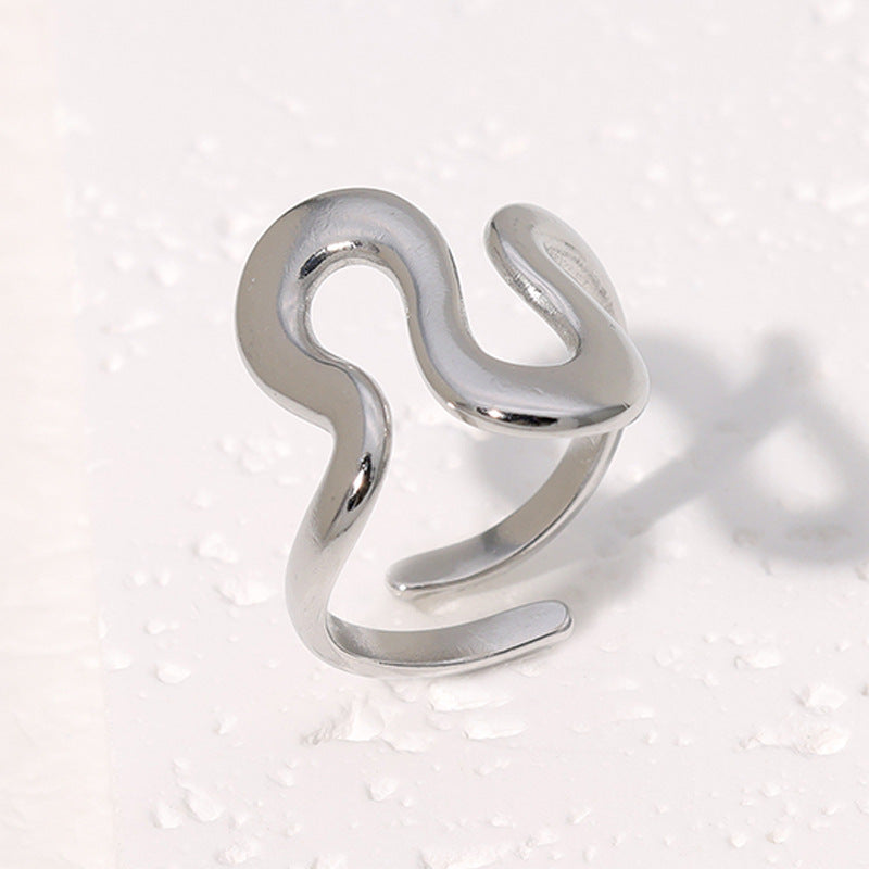 Anello titanio geometrico regolabile