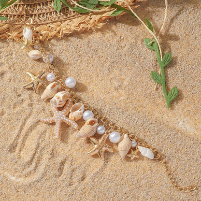 Cavigliera conchiglie bohemien con perle