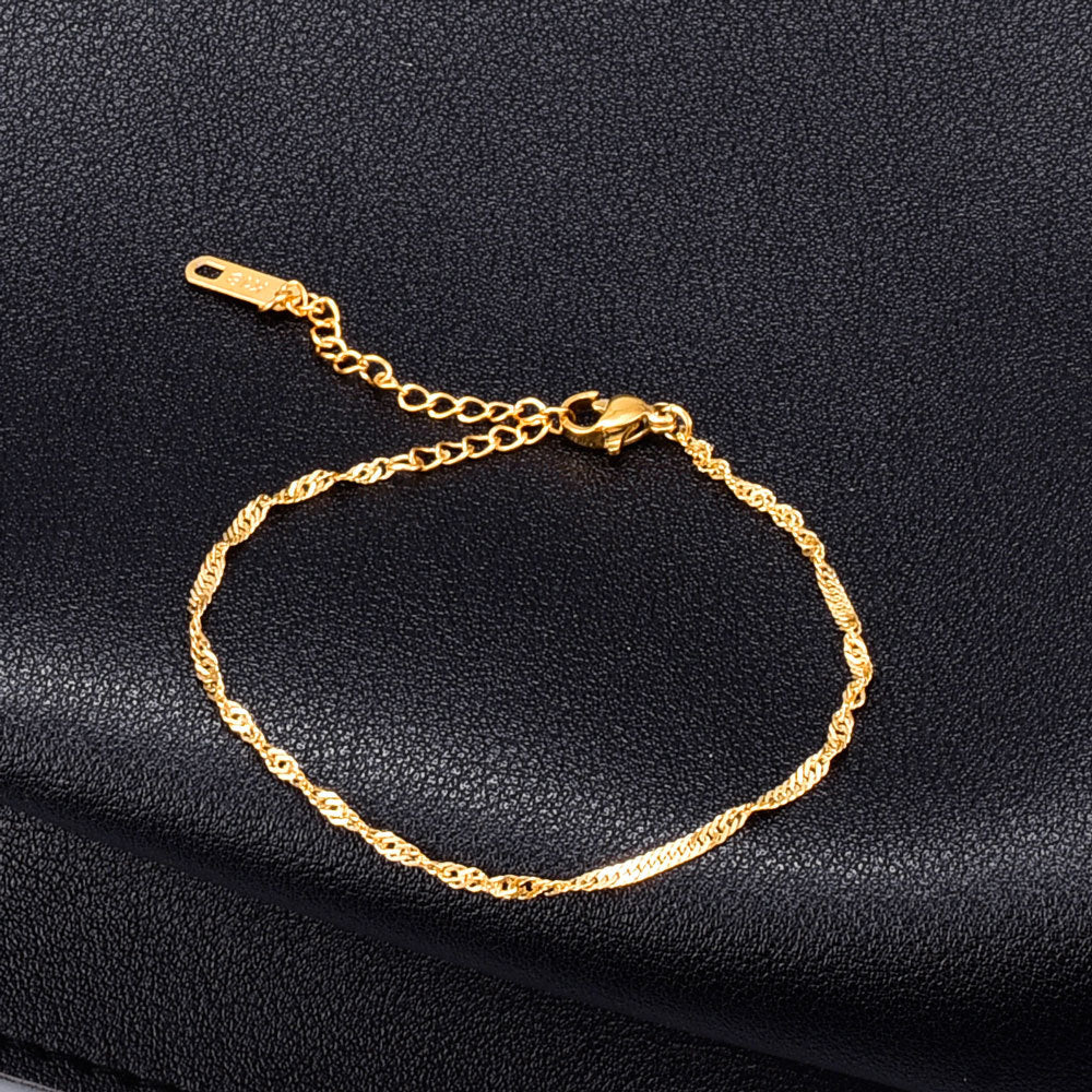 Bracciale titanio placcato oro a spira