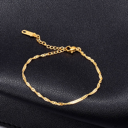 Bracciale titanio placcato oro a spira