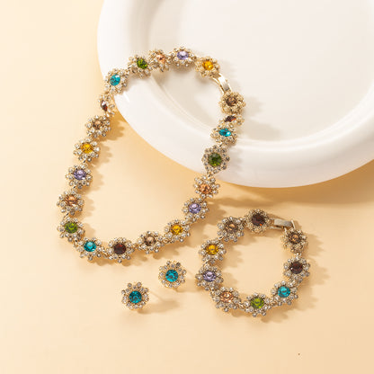 Set collana, orecchini e bracciale strass
