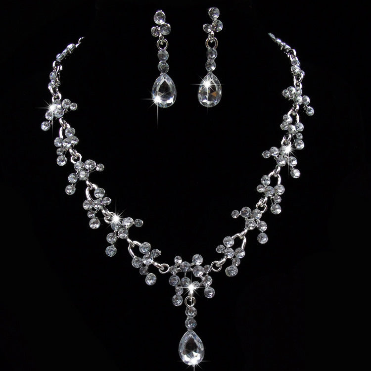Set orecchini e collana fiori