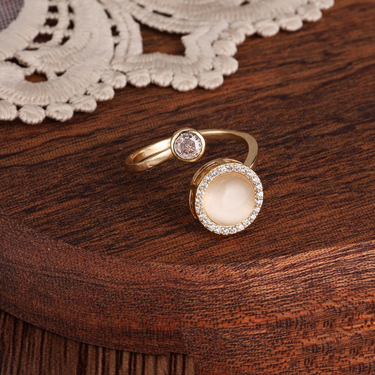 Anello fiore zircone rotante