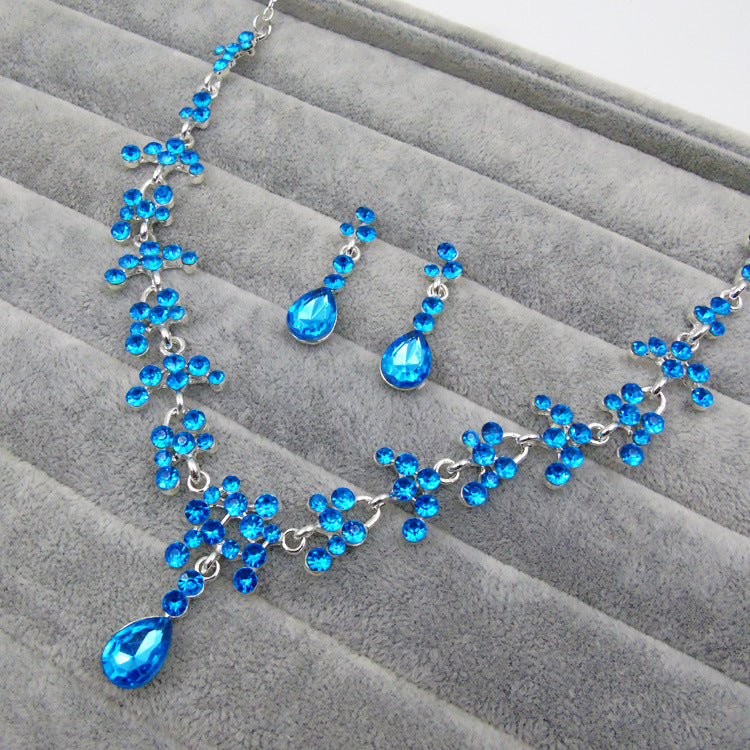 Set orecchini e collana fiori
