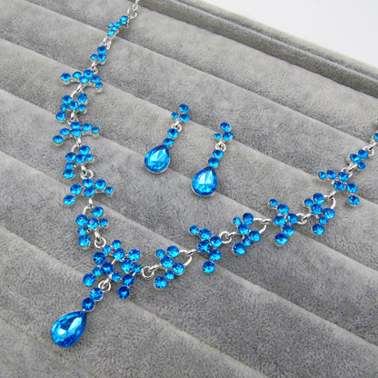 Set orecchini e collana fiori