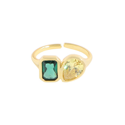 Anello smeraldo e zircone geometrico