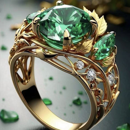 Anello smeraldo e diamanti con decoro floreale