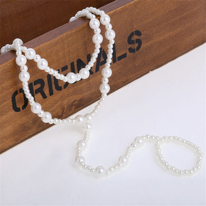 Set cavigliera e anello con perle