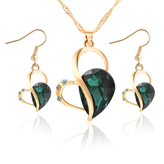 Collana e orecchini cuori di perla