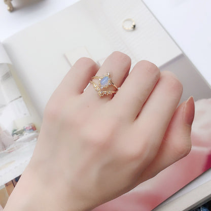 Anello pietre blu e opale
