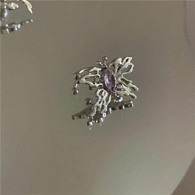 Orecchini farfalla diamante viola