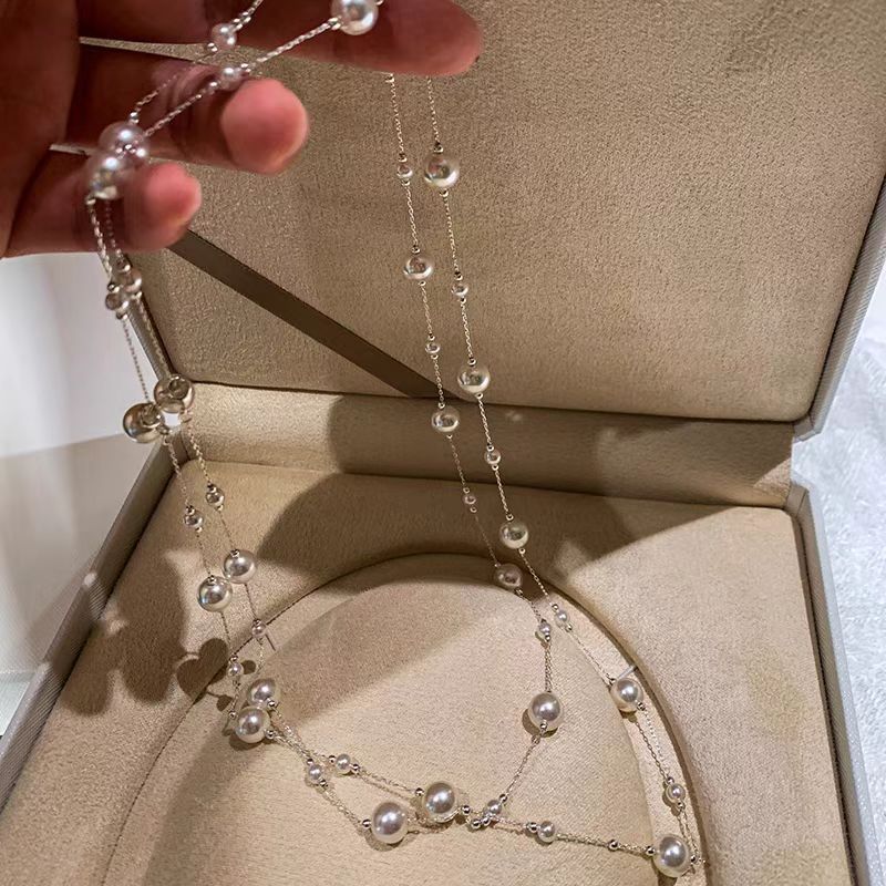 Collana lunga con perle