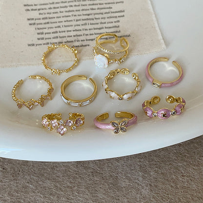Anello farfalla e fiore viola