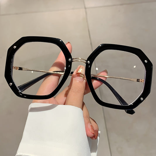 Occhiali montatura poligonale oversize