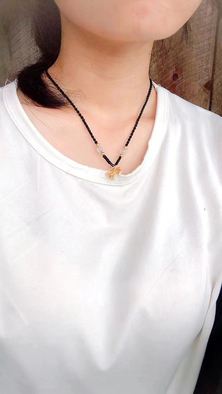 Collana fiocco intrecciata oro