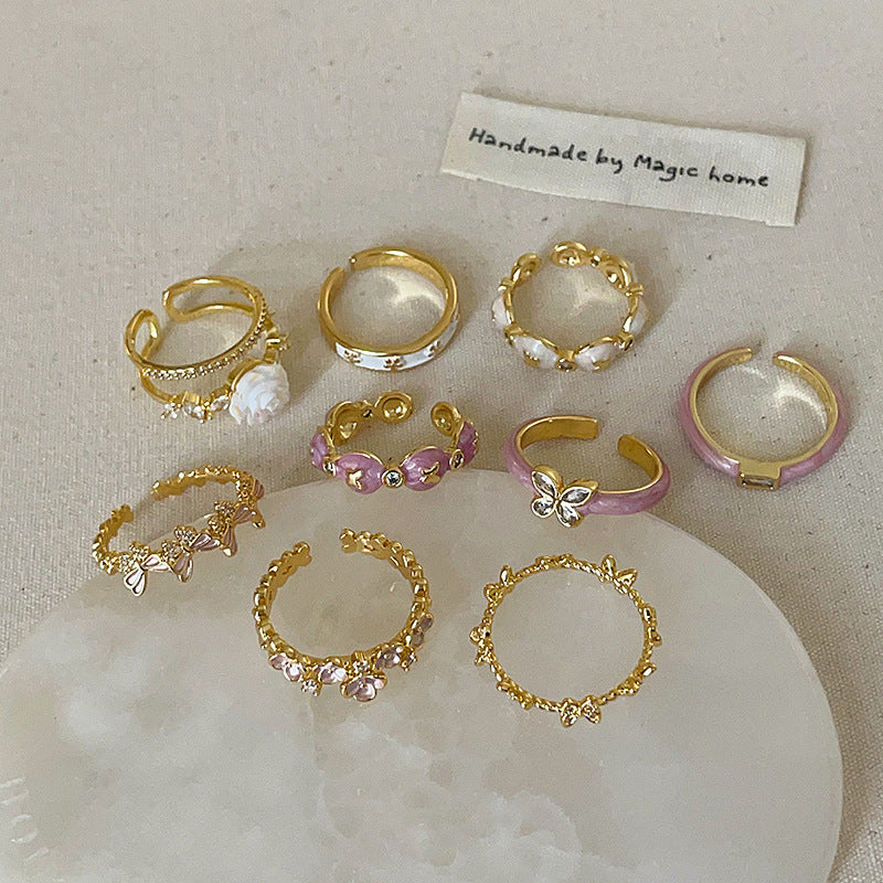 Anello farfalla e fiore viola