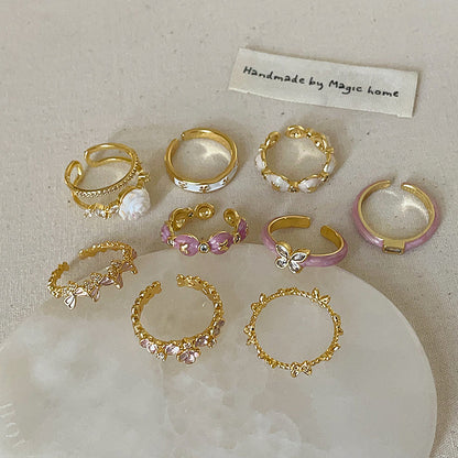 Anello farfalla e fiore viola
