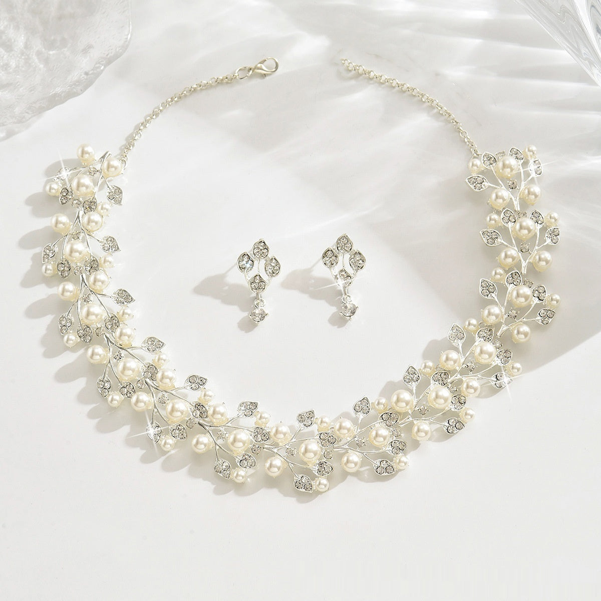 Set gioielli perle a foglia
