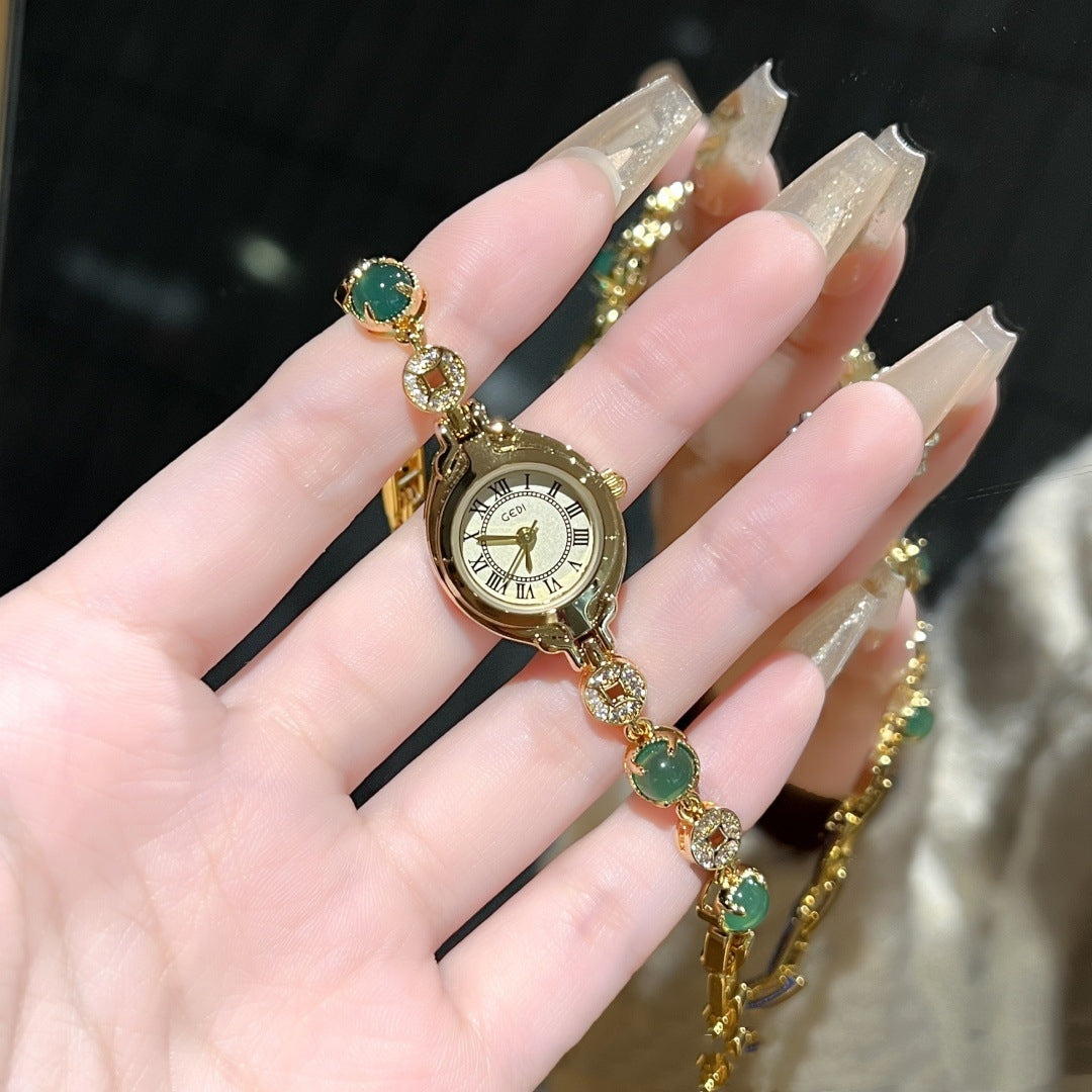 Orologio dorato vintage raffinato