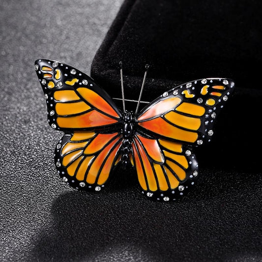 Spilla farfalla strass gocciolante