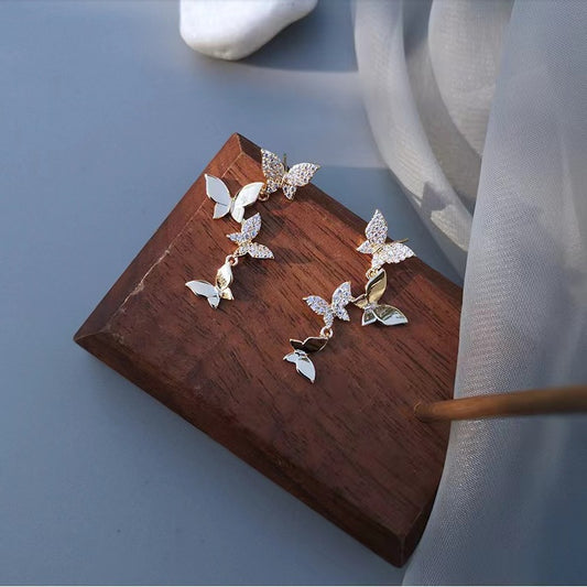 Orecchini farfalle rame