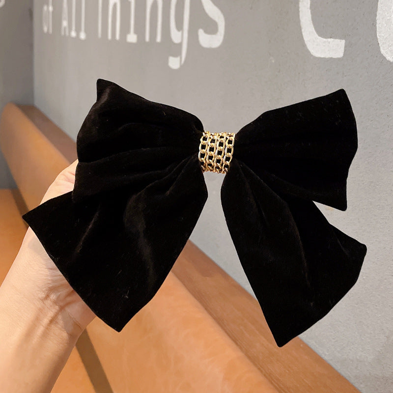 Spillone fiocco velluto rosso