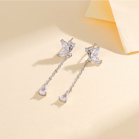 Orecchini farfalla zircone con nappina