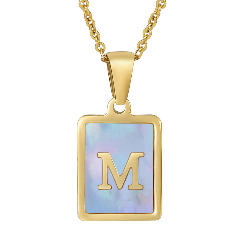 Collana titanio con lettera e conchiglia