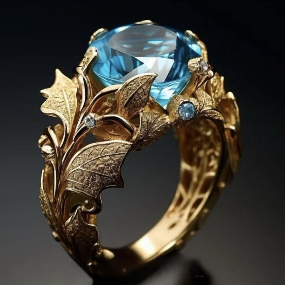 Anello placcato oro pietra blu