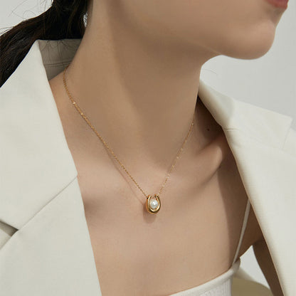 Anello a U perla acciaio titanio