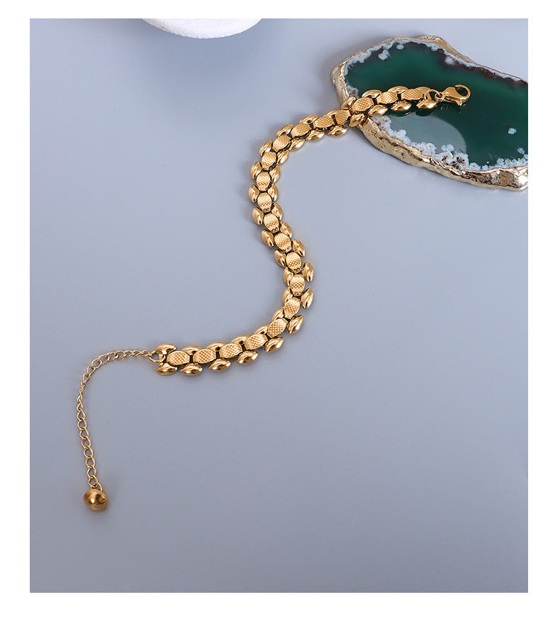 Bracciale titanio oro 18K