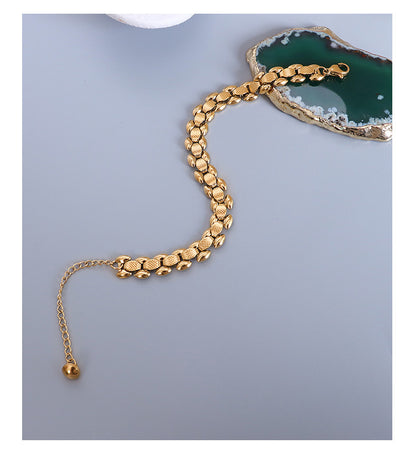 Bracciale titanio oro 18K