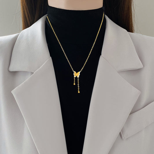 Collana farfalla nappina oro