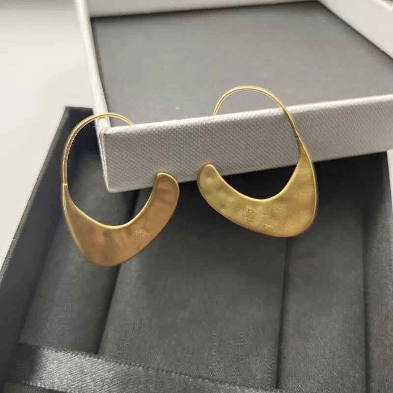 Orecchini geometrici dorati in ottone
