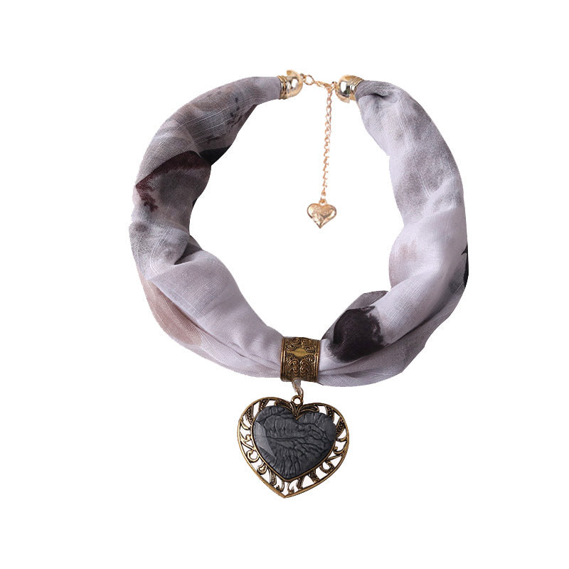 Collana cuore pesca etnico