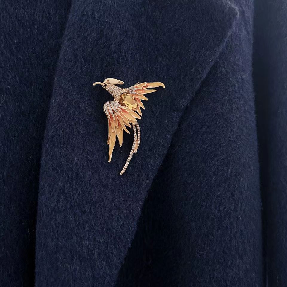 Spilla fenice dipinta