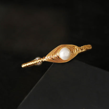 Bracciale perla barocca con filo avvolto