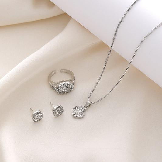 Set collana anello orecchini diamanti geometrico