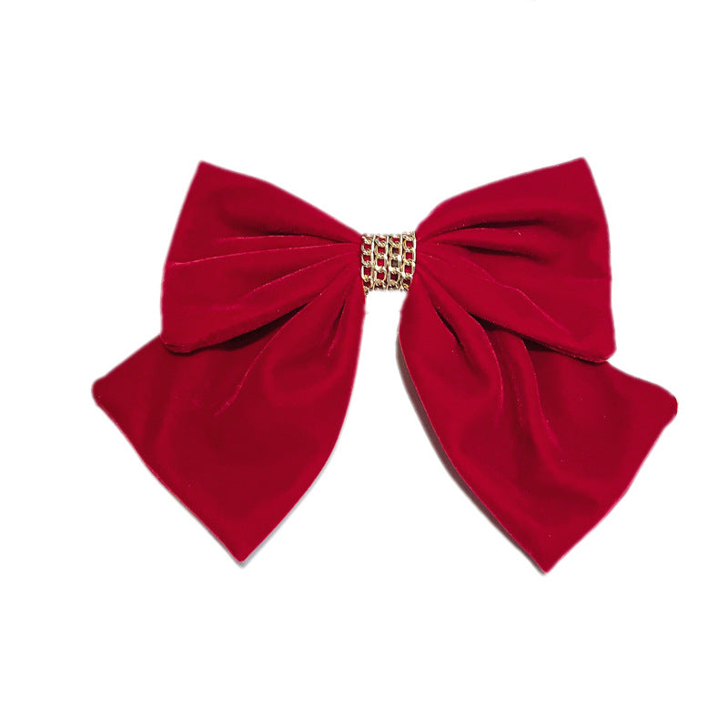 Spillone fiocco velluto rosso