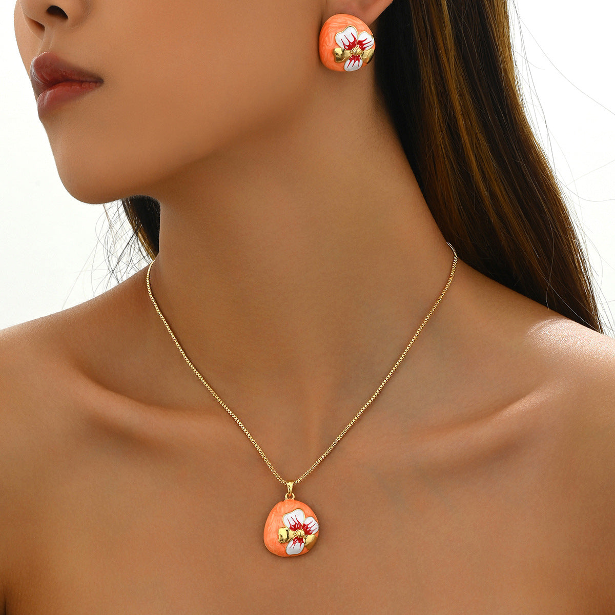 Collana e orecchini fiore