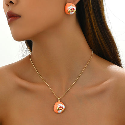 Collana e orecchini fiore