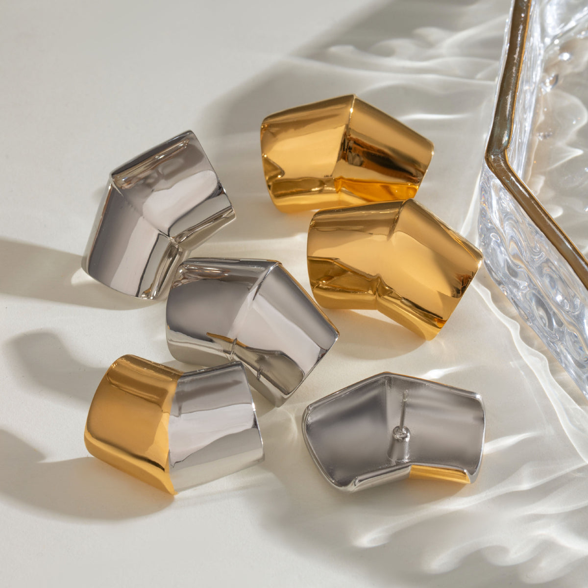 Orecchini geometrici oro acciaio