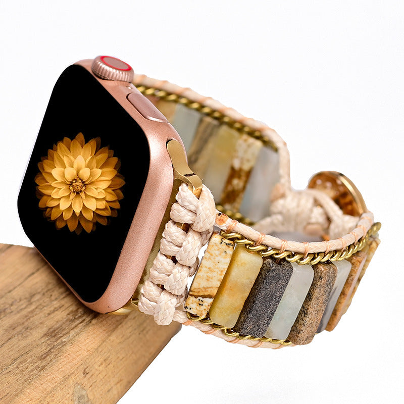 Orologio con cinturino intrecciato pietre