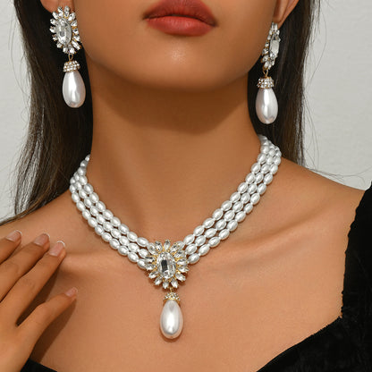 Set collana e orecchini perle geometriche
